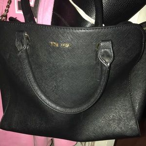 Nine West purse new, a lot of space 3 section middle zipper and 2 inside pockets